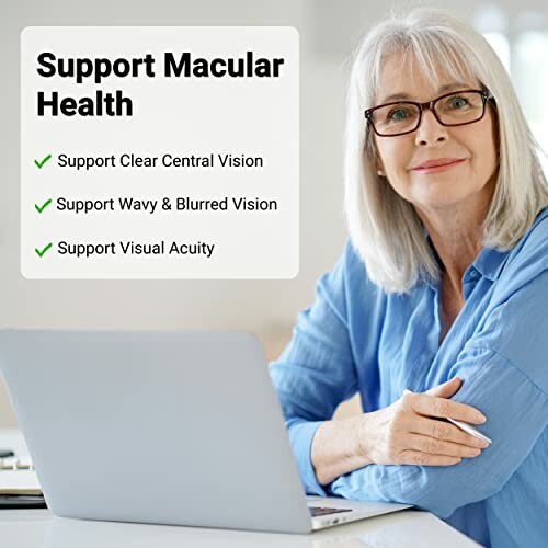 Woman with glasses using a laptop, promoting macular health support.