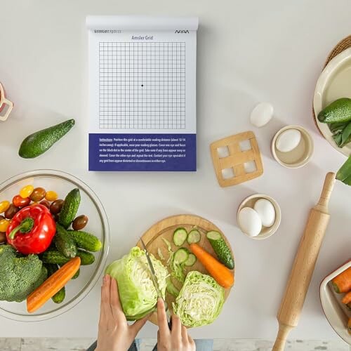 Top view of vegetable prep with Amsler grid for AMD awareness.